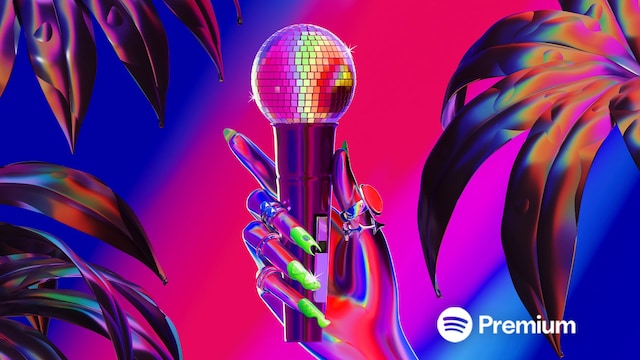 A rainbow colored scene shows a hand holding a shiny disco ball microphone in front of tropical plants with the Spotify premium logo in the corner